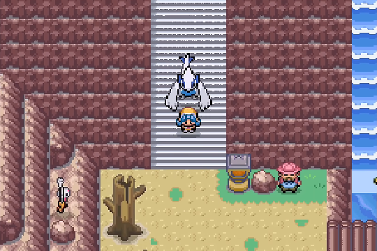 Player exploring a cliffside route with waterfalls in Pokemon SoulGold