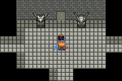 Player exploring a stone chamber with statues in Pokemon SoulGold